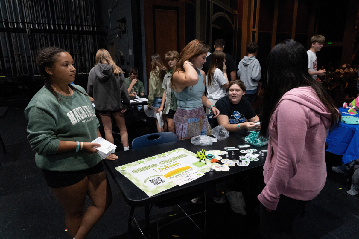 Members of Bring Change to Mind club visit with potential freshman members.